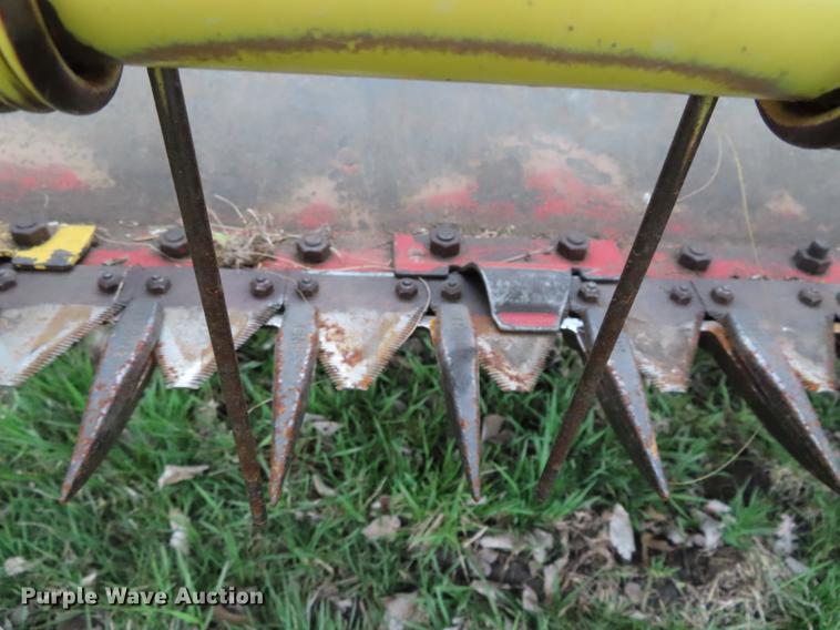 image for item DF7795 1994 New Holland 116 windrower