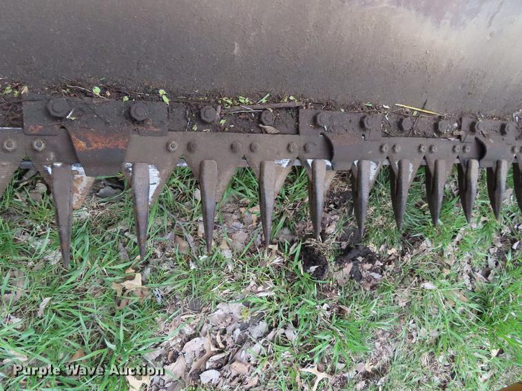 image for item DF7796 1992 New Holland 116 windrower
