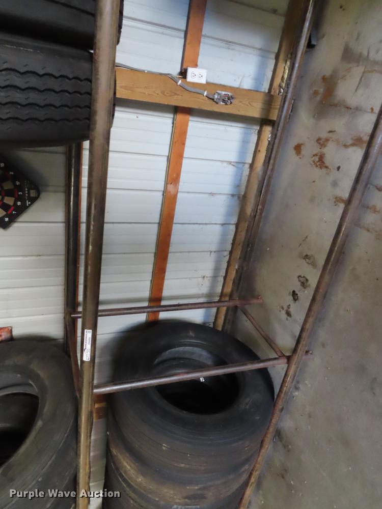 image for item DI9466 Tire rack and tires