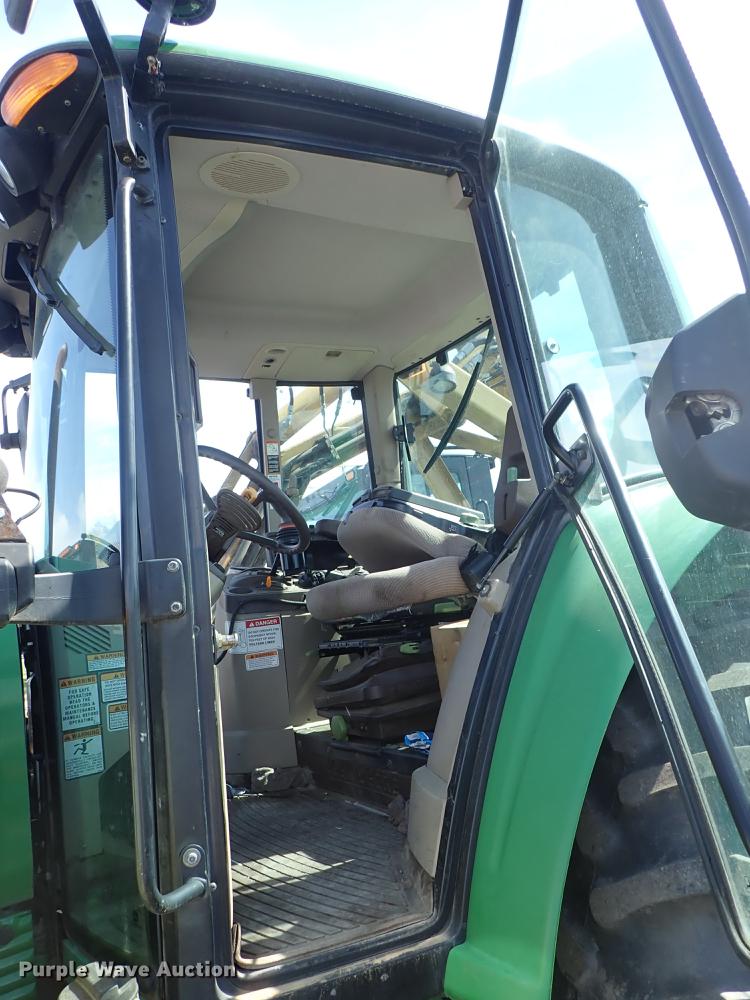 image for item DF1072 2007 John Deere 7220 MFWD tractor with side boom mower