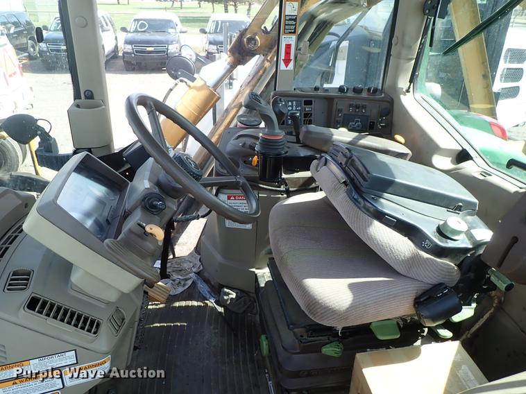 image for item DF1072 2007 John Deere 7220 MFWD tractor with side boom mower