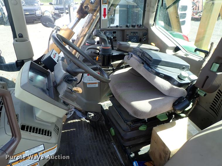image for item DF1072 2007 John Deere 7220 MFWD tractor with side boom mower