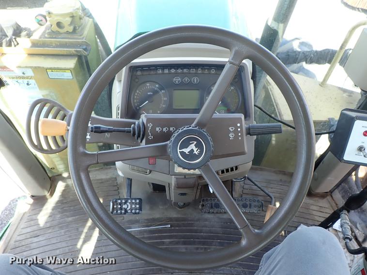 image for item DF1072 2007 John Deere 7220 MFWD tractor with side boom mower