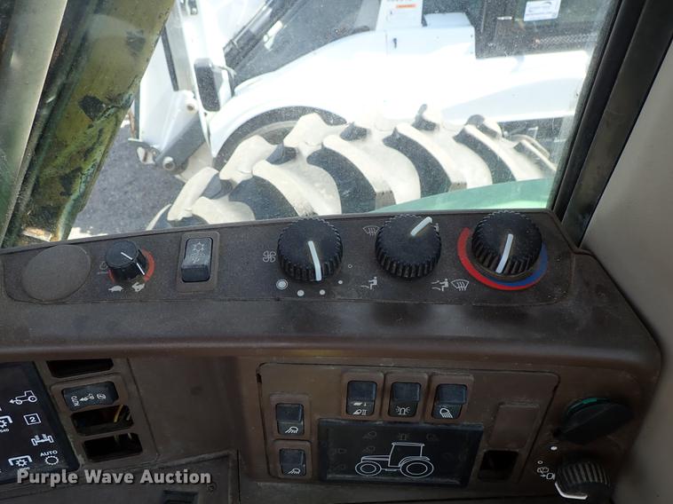 image for item DF1072 2007 John Deere 7220 MFWD tractor with side boom mower