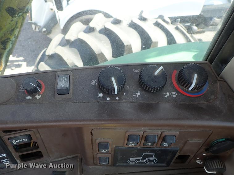 image for item DF1072 2007 John Deere 7220 MFWD tractor with side boom mower