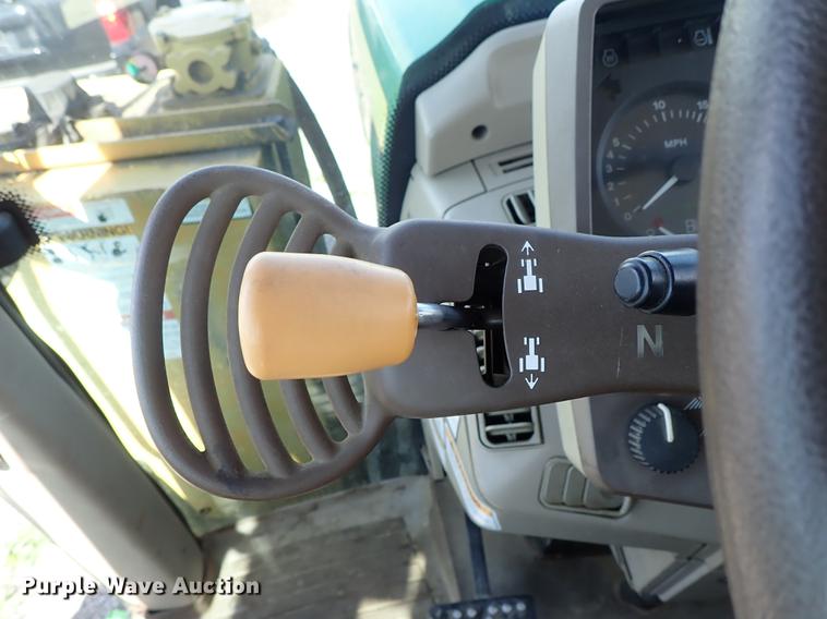 image for item DF1072 2007 John Deere 7220 MFWD tractor with side boom mower