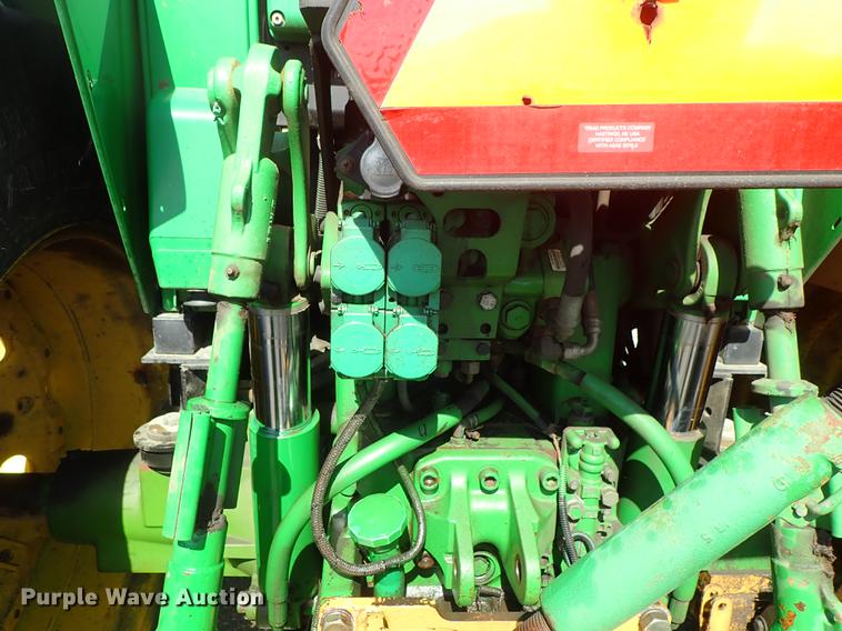 image for item DF1072 2007 John Deere 7220 MFWD tractor with side boom mower