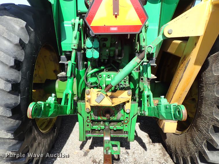 image for item DF1072 2007 John Deere 7220 MFWD tractor with side boom mower