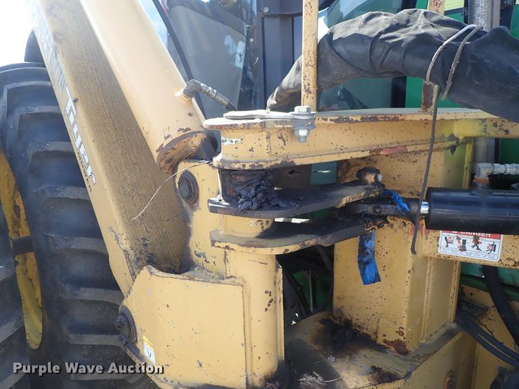 image for item DF1072 2007 John Deere 7220 MFWD tractor with side boom mower