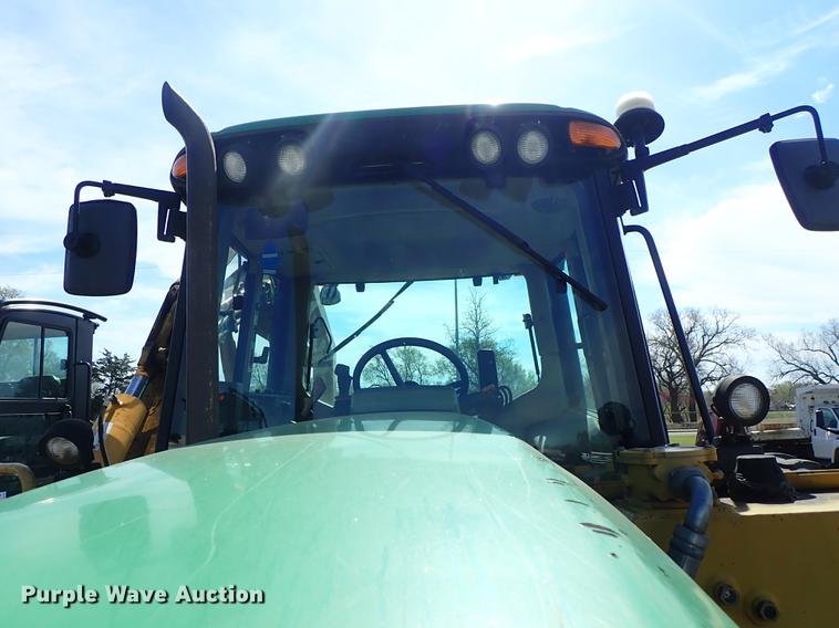 image for item DF1072 2007 John Deere 7220 MFWD tractor with side boom mower