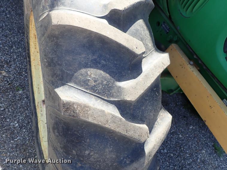 image for item DF1072 2007 John Deere 7220 MFWD tractor with side boom mower