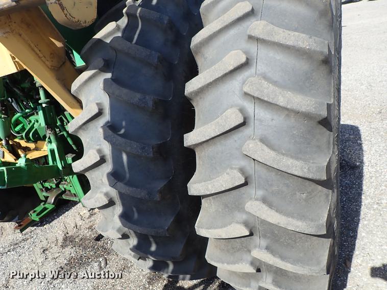 image for item DF1072 2007 John Deere 7220 MFWD tractor with side boom mower