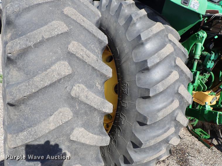 image for item DF1072 2007 John Deere 7220 MFWD tractor with side boom mower