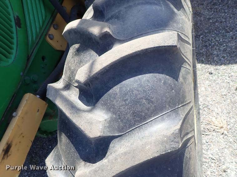 image for item DF1072 2007 John Deere 7220 MFWD tractor with side boom mower