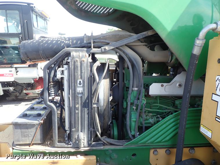 image for item DF1072 2007 John Deere 7220 MFWD tractor with side boom mower