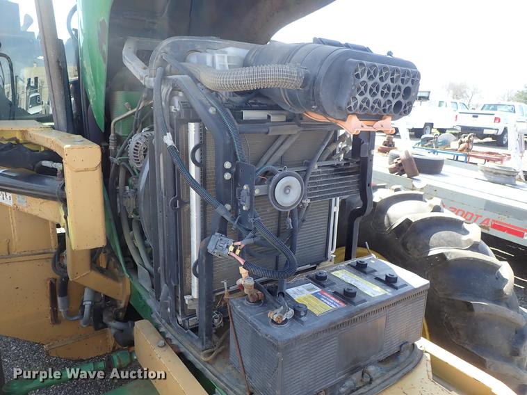 image for item DF1072 2007 John Deere 7220 MFWD tractor with side boom mower