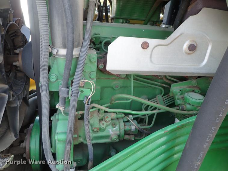 image for item DF1072 2007 John Deere 7220 MFWD tractor with side boom mower