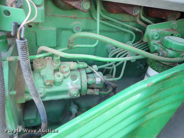 image for item DF1072 2007 John Deere 7220 MFWD tractor with side boom mower