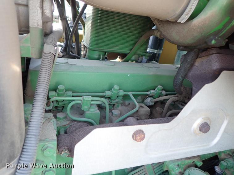 image for item DF1072 2007 John Deere 7220 MFWD tractor with side boom mower