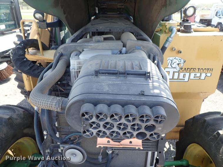 image for item DF1072 2007 John Deere 7220 MFWD tractor with side boom mower