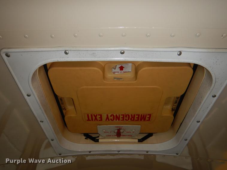 image for item DG1042 1998 International Mid Bus 3400 school bus