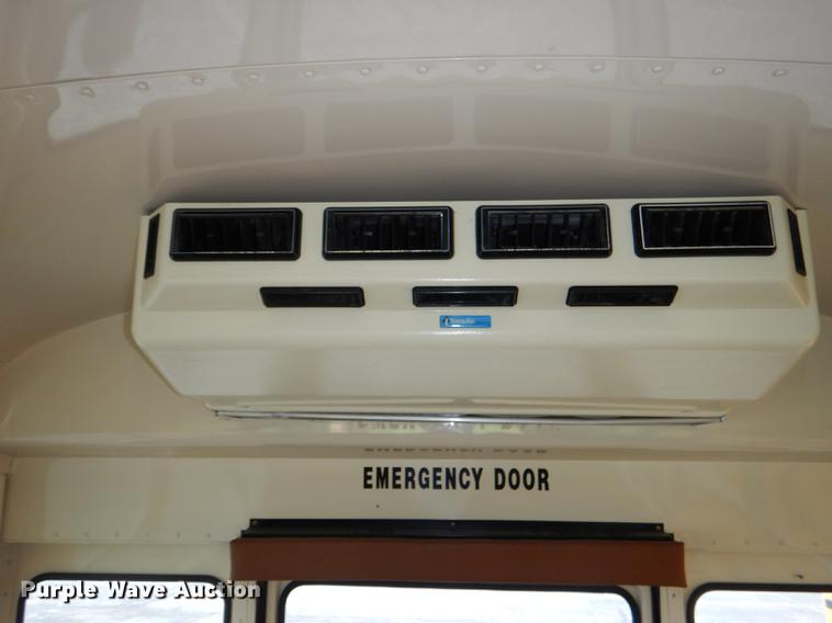 image for item DG1042 1998 International Mid Bus 3400 school bus