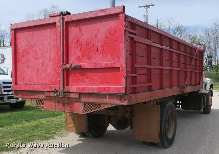 image for item DB8801 1990 GMC C6000 flat dump bed truck