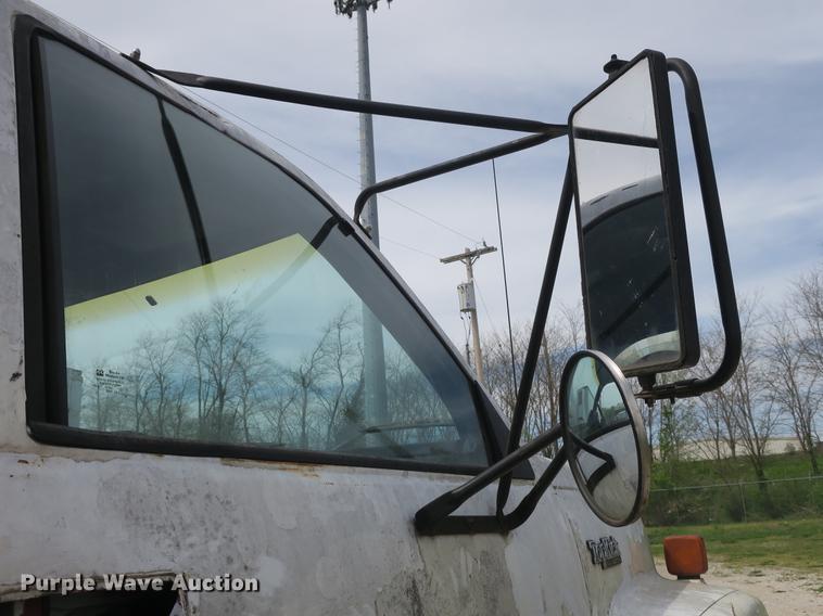 image for item DB8801 1990 GMC C6000 flat dump bed truck