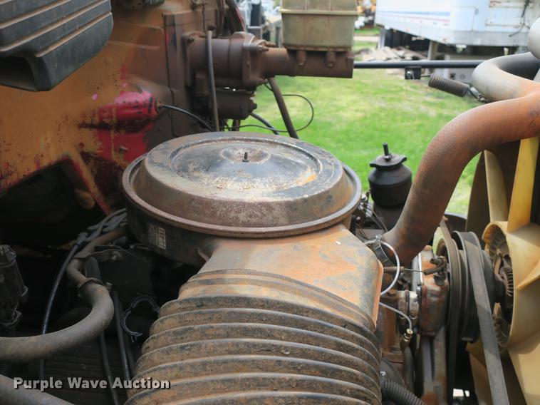 image for item DB8801 1990 GMC C6000 flat dump bed truck