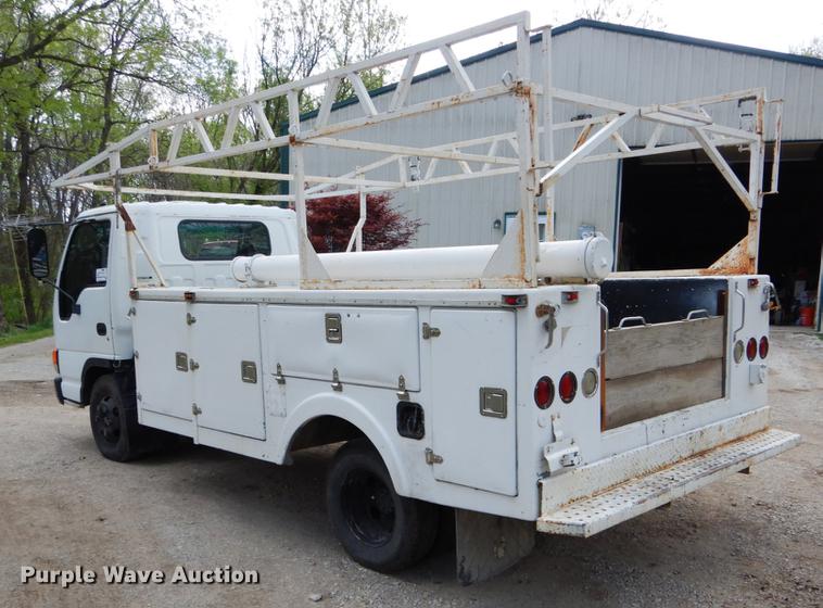 image for item DE8335 2000 Isuzu NPR utility truck