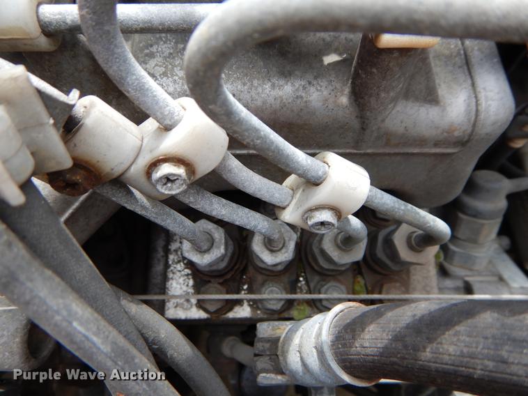 image for item DE8335 2000 Isuzu NPR utility truck