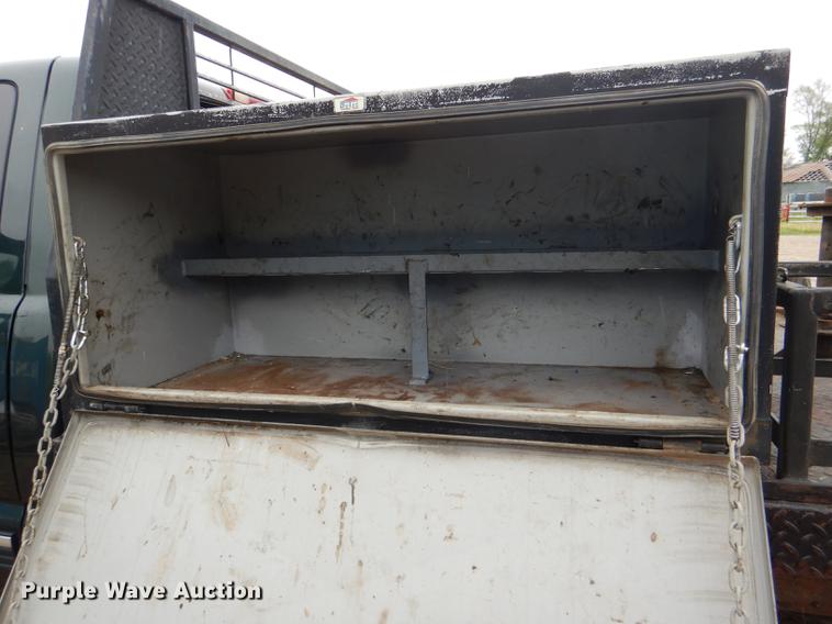 image for item DG1050 2002 Chevrolet Silverado 2500 Ext. Cab flatbed pickup truck