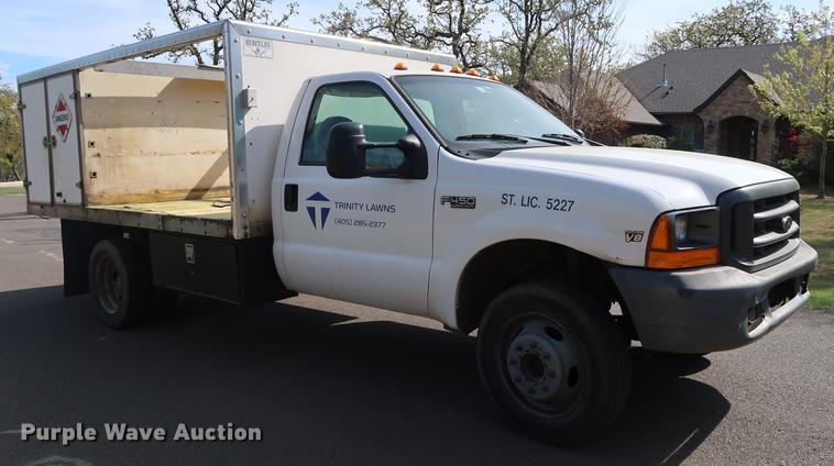 image for item FE9606 1999 Ford F450 Super Duty flatbed applicator truck