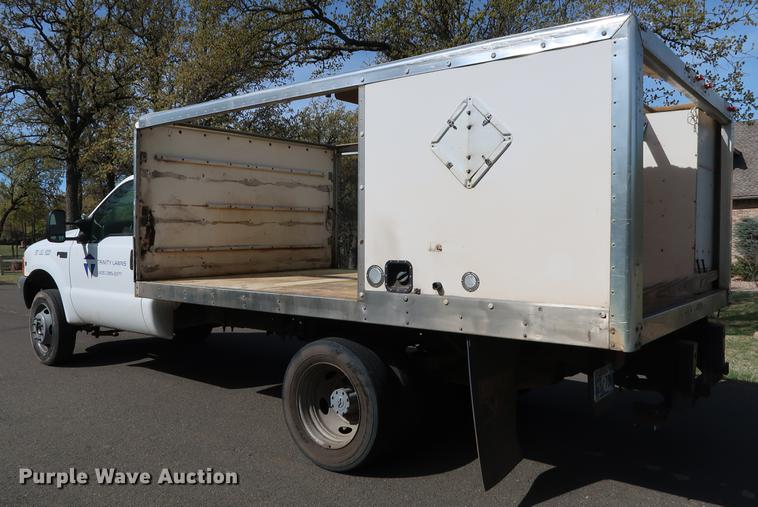 image for item FE9606 1999 Ford F450 Super Duty flatbed applicator truck