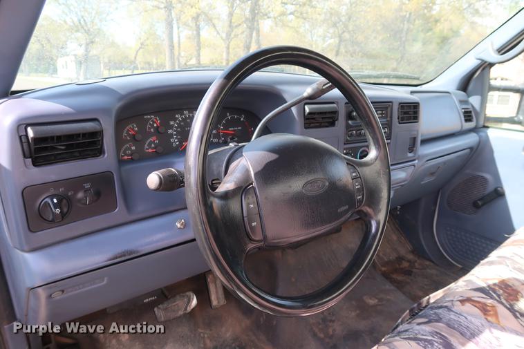 image for item FE9606 1999 Ford F450 Super Duty flatbed applicator truck