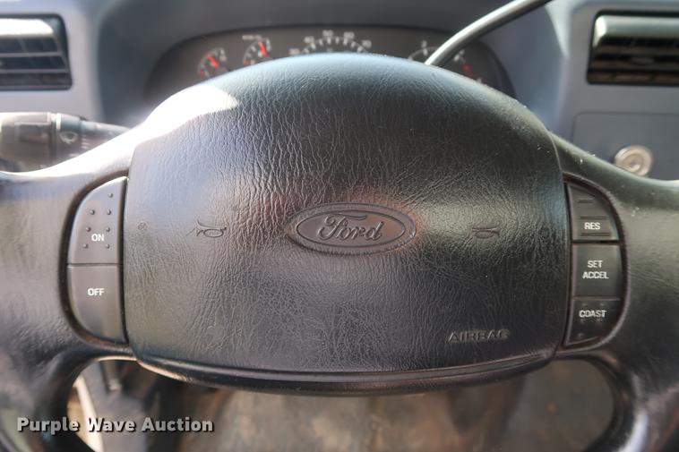 image for item FE9606 1999 Ford F450 Super Duty flatbed applicator truck