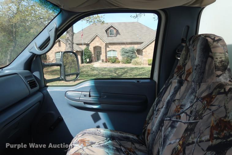 image for item FE9606 1999 Ford F450 Super Duty flatbed applicator truck