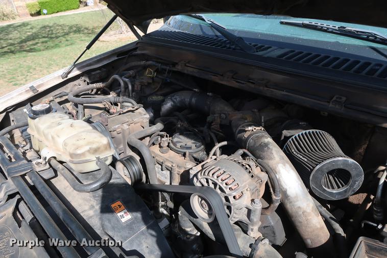 image for item FE9606 1999 Ford F450 Super Duty flatbed applicator truck