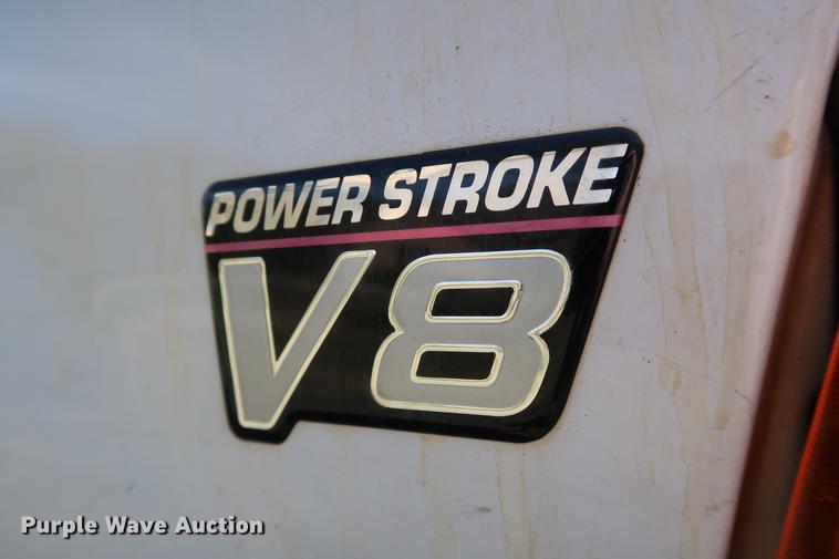 image for item FE9606 1999 Ford F450 Super Duty flatbed applicator truck