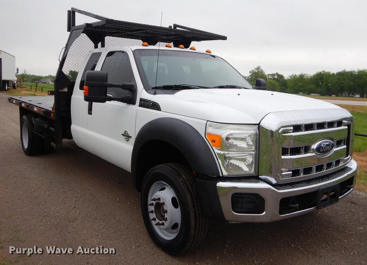 image for item FH9309 2012 Ford F550 Super Duty SuperCab flatbed truck