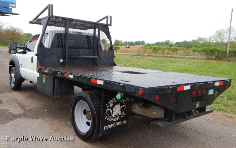 image for item FH9309 2012 Ford F550 Super Duty SuperCab flatbed truck