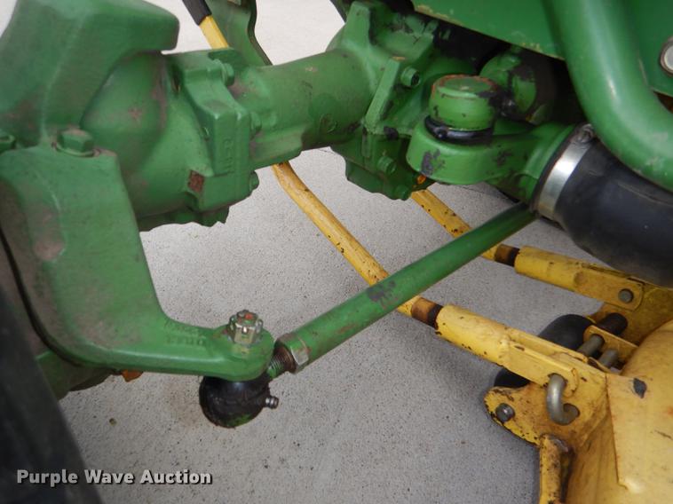 image for item FK9115 1992 John Deere 670 MFWD tractor