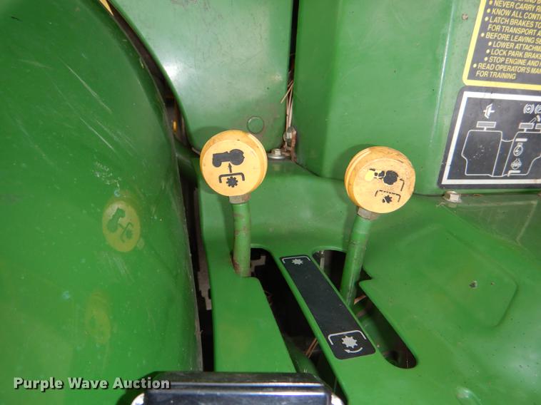 image for item FK9115 1992 John Deere 670 MFWD tractor