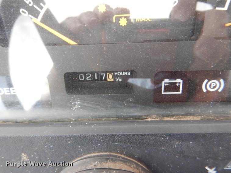 image for item FK9115 1992 John Deere 670 MFWD tractor