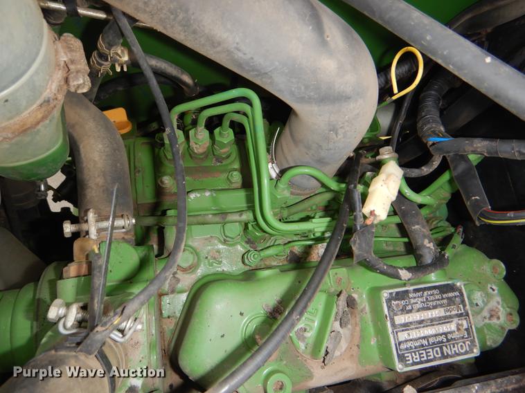 image for item FK9115 1992 John Deere 670 MFWD tractor