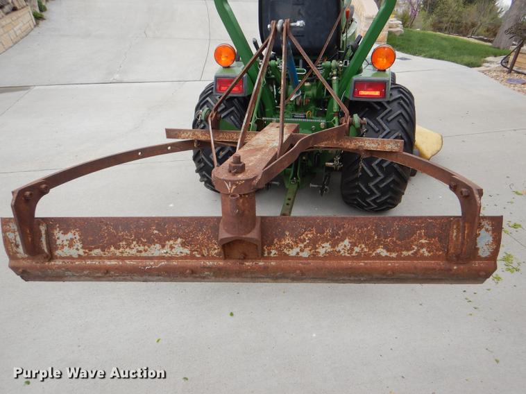 image for item FK9115 1992 John Deere 670 MFWD tractor