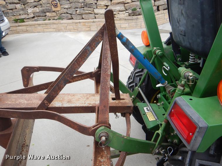 image for item FK9115 1992 John Deere 670 MFWD tractor