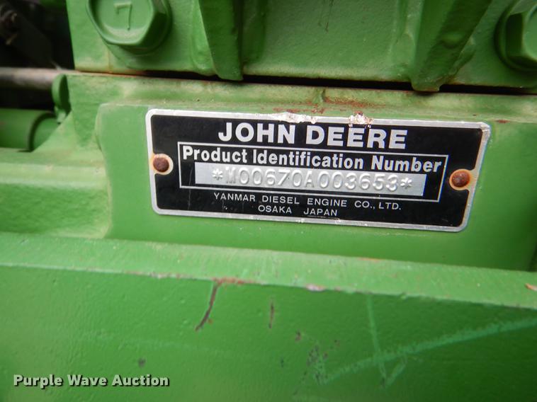 image for item FK9115 1992 John Deere 670 MFWD tractor