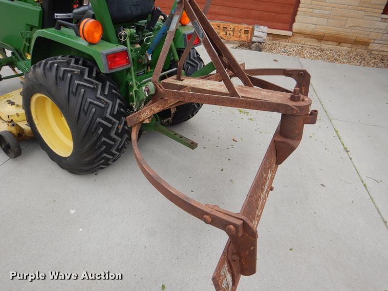 image for item FK9115 1992 John Deere 670 MFWD tractor