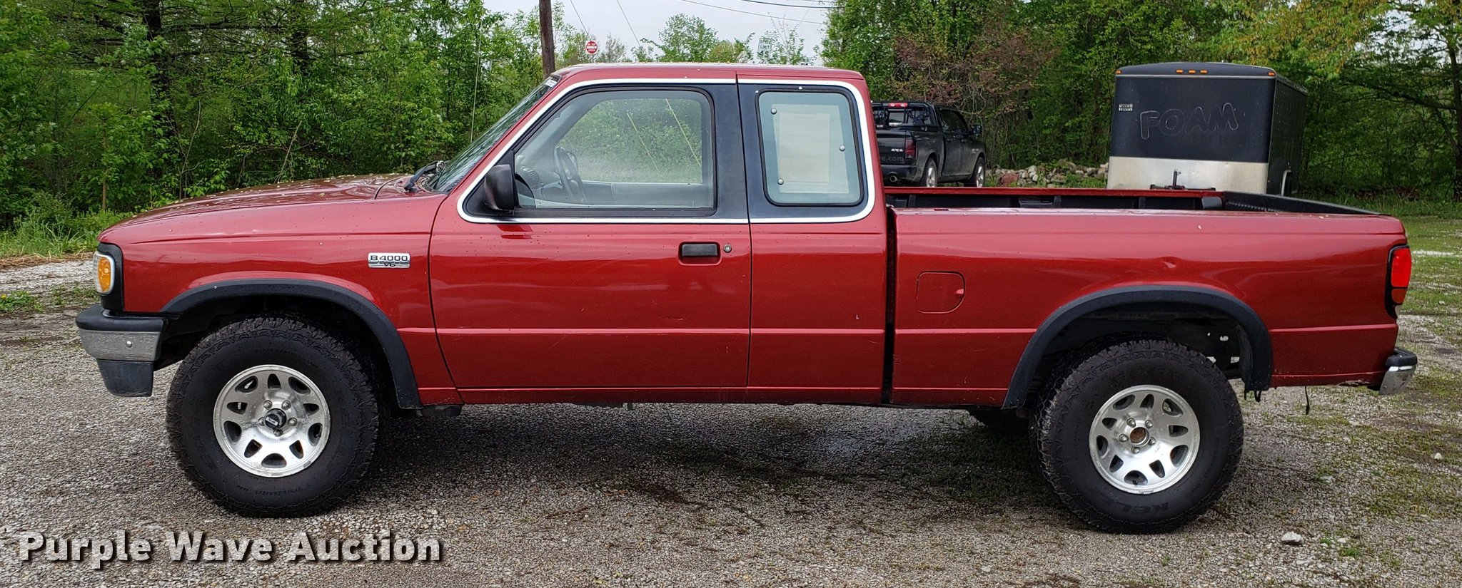 1997 Mazda B4000 Cab Plus pickup truck in Buckner, MO Item EN9911